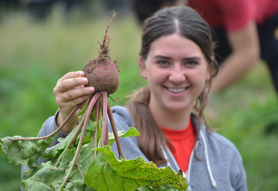 Planting seeds of service through community garden