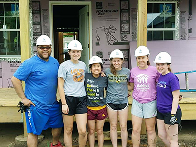 Carol Dao poses with other members of the Habitat for Humanity Club, where she served as the president this past school year. From left: Nazeer Zerka, Wellness Center counselor, and students Daynalyn Jostock, Dao, Abigail Mazurek, Rebecca Behm, and Samantha Henning.
