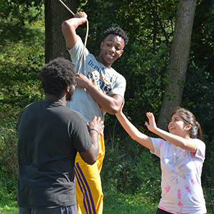 Photo of Kareem Anthony-Bello at a recent FGI Retreat with his classmates Stanley Wright and Crystal Chavez.